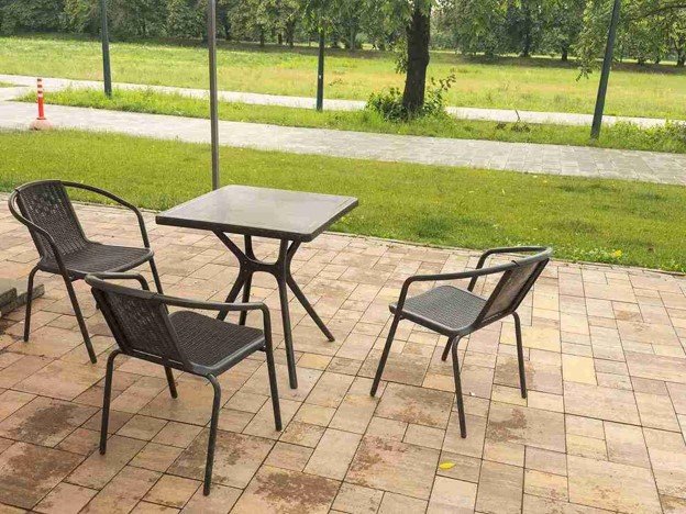 Completed concrete patio with outdoor seating area and clean paver layout in Middleburg Heights, OH